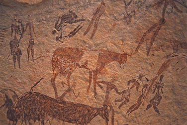 Dartsellungen von Personen und Rindern